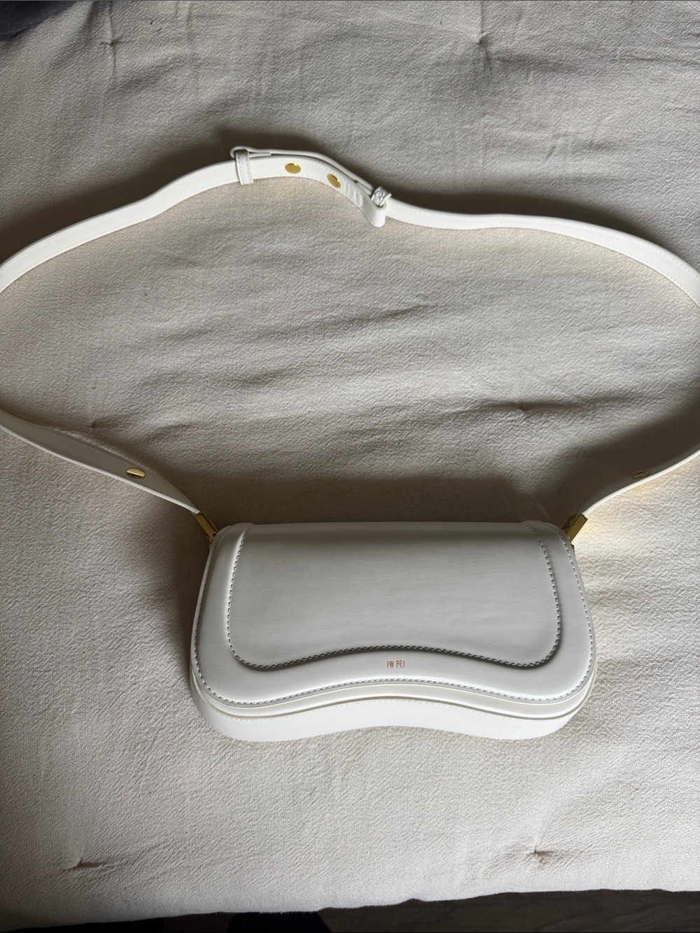 JW PEI White Saddle Crossbody Bag with Gold Accents